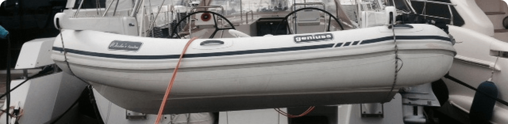 Couple of dinghy davits on the deck of a sailboats